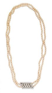 * A Kramer Double Strand Faux Pearl Necklace