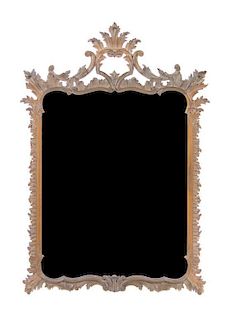 An Italian Rococo Style Mirror 20TH CENTURY Height 51 x width 34 1/4 inches.