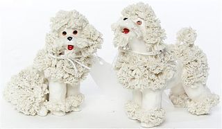 A Pair of Porcelain Models of Poodles Height of tallest 3 1/2 inches.