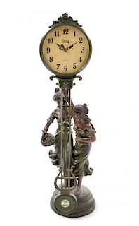 A Crosa Spelter Swing-Arm Mantle Clock Height 25 3/4 inches.