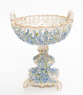 * A German Porcelain Reticulated Compote Height 10 1/2 inches.