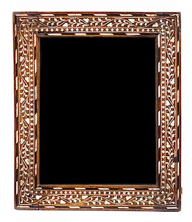 * A Middle Eastern Bone Inlaid Mirror Height 12 3/4 x width 10 3/4 inches.