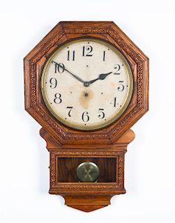 * An American Victorian Wall Clock, Waterbury Height 26 1/4 inches.