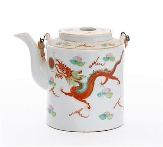 * A Chinese Polychrome Enameled Porcelain Teapot. Height 6 1/4 inches.