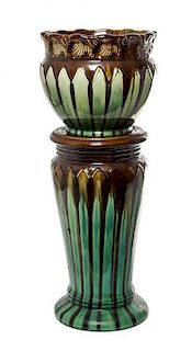 A Majolica Jardiniere and Pedestal Height overall 27 1/2 inches.