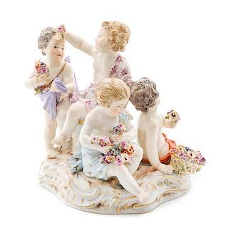 A Meissen Porcelain Figural Group Height 6 3/8 inches.