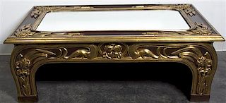 An Art Nouveau Style Painted and Parcel Gilt Low Table Height 16 1/2 x width 49 1/2 x depth 30 inches.