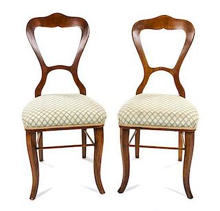 A Pair of Biedermeier Birch Side Chairs Height 37 1/4 inches.