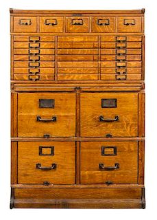 * A Victorian Oak Collector's Cabinet, Yawmanen and Erbe Manufacturing, Rochester New York Height 49 3/4 x width 33 x depth 18 i