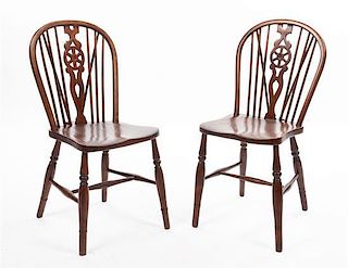 A Pair of English Oak Windsor Chairs Height 34 1/2 inches.