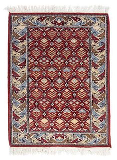 * A Persian Wool Mat 2 feet 11 inches x 3 feet 6 inches.