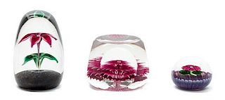 * A Group of Glass Paperweights Width of largest 3 1/4 inches.