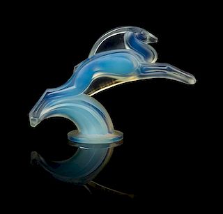A Sabino Opalescent Molded Glass Figure Height 4 x width 6 x dept 2 inches.