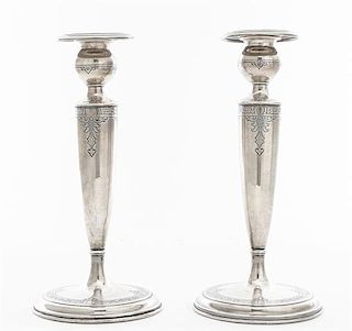 A Pair of American Silver Candlesticks, Lebkuecher & Co., Newark, NJ, with bulbous candle cups, weighted