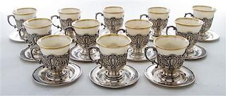 * A Set of Twelve American Silver Demitasse Cups and Liners, Dominick & Haff, New York, NY, each with a Lenox porcelain liner an