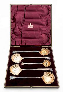 * A Cased English Silver-Plate Serving Set, Mappin & Webb, Sheffield and London, comprising four serving spoons with shell-form