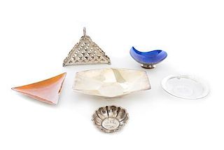 * A Group of Table Articles, 20th Century, comprising a German silver napkin holder, a silver triangular dish with orange enamel