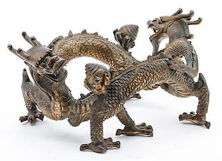 A Chinese Bronze Figural Stand Width 9 3/4 inches.