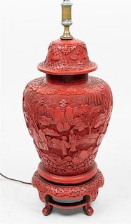 * A Chinese Cinnabar Lacquer Vase and Cover Height of vase with stand 16 1/2 inches.
