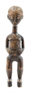 * An African Carved Figure Height 15 1/8 inches.