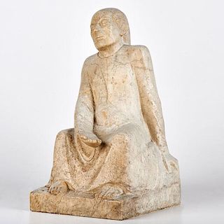 SCULPTURE OF A SEATED MAN
