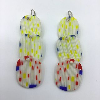 Carved glass earrings with silver plated ear wire