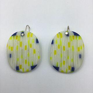 Carved glass earrings with silver plated ear wire