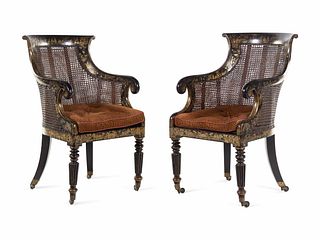 A Pair of William IV Parcel Gilt Japanned and Cane Upholstered Armchairs