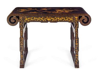 A Chinese Export Black and Gilt Lacquered Scroll Table