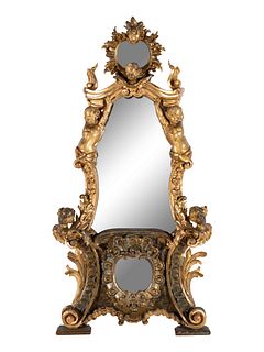 An Italian Rococo Figural Carved Giltwood Mirror