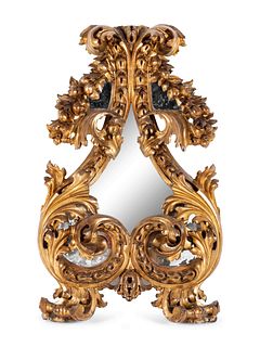 A Florentine Rococo Revival Carved Giltwood Mirror