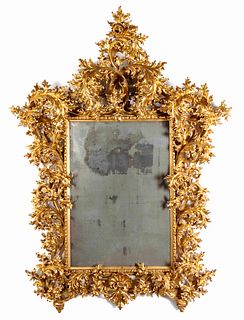 An Italian Baroque Style Carved Giltwood Mirror