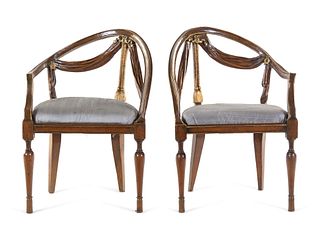 A Pair of Italian Parcel Gilt Walnut Armchairs