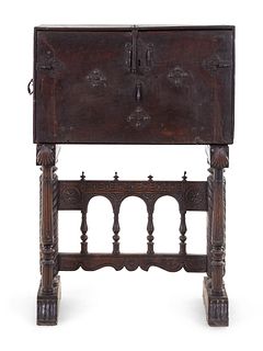 A Spanish Iron Mounted Carved Walnut VargueÃ±o on Stand