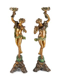A Pair of Continental Gilt and Polychromed Figural Torcheres