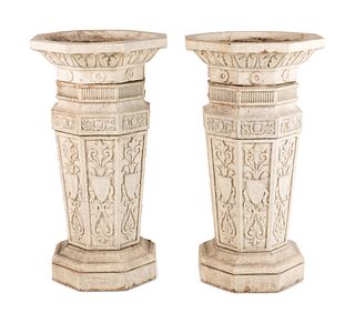 A Pair of Glazed Terra Cotta Urns and Pedestals