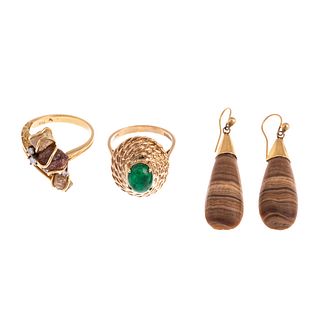 A Collection of Rings & Earrings in Gold