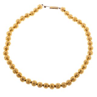 A High Karat Hand Chased Bead Necklace