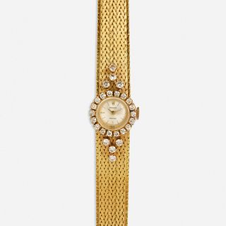 Rolex, Lady's gold and diamond wristwatch