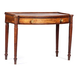 An English Sheraton Carved and Reeded Mahogany Writing Table 
