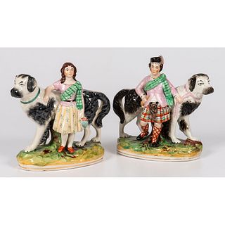 A Pair of Staffordshire Royal Children with Newfoundland Dogs
