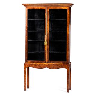 A Continental Curio Cabinet on Frame