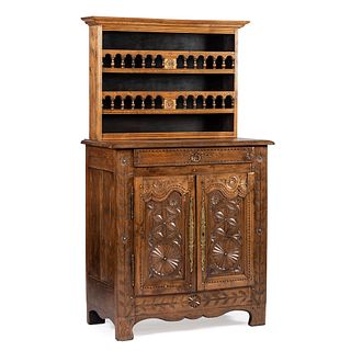 A Continental Carved Stepback Cupboard
