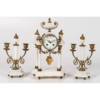 A Continental Gilt Metal and Alabaster Clock Garniture