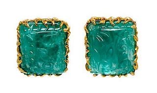 A Pair of 18 Karat Yellow Gold and Carved Emerald Earclips, 24.50 dwts.