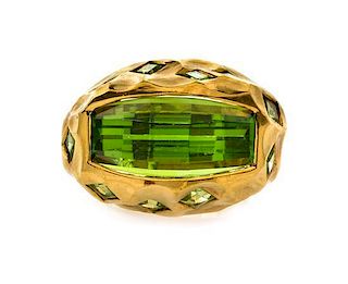 An 18 Karat Yellow Gold and Peridot Ring, Tony Duquette, 15.90 dwts.
