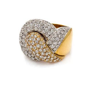 An 18 Karat Two Tone Gold and Diamond Ring, 12.10 dwts.