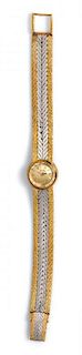 An 18 Karat Two-Tone Gold Wristwatch, Piaget, 25.70 dwts.