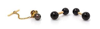 A Pair of 14 Karat Yellow Gold and Onyx Cufflinks, Tiffany & Co., 7.50 dwts.