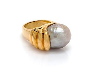 An 18 Karat Yellow Gold and Cultured Pearl Ring, Gump's, 16.30 dwts.